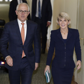 Malcolm Turnbull and Julie Bishop leave the party room meeting for the leadership at Parliament House in Canberra on  Friday.