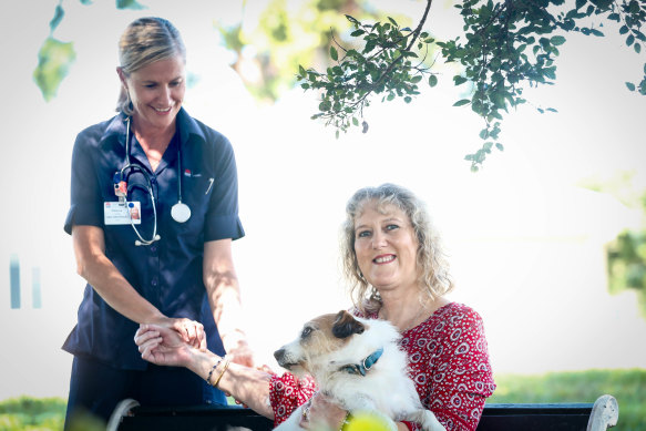 Clinical nurse Rebecca Lyon with hospital in the home patient Karen Troy-Smith.