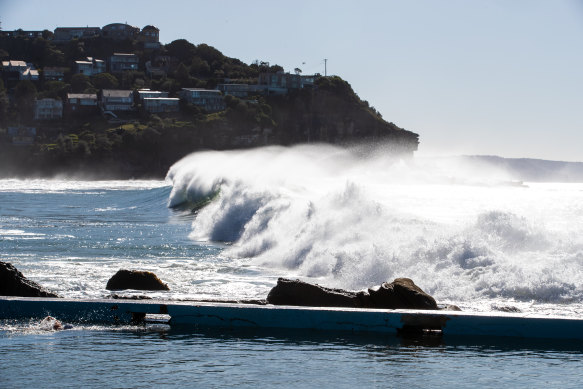 Waves crash into shore at Whale Beach in Sydney’s north on Sunday.