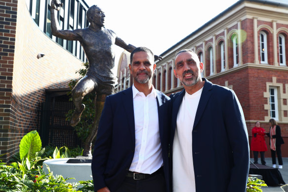 Swans greats Michael O’Loughlin and Adam Goodes unveil the Goodes statue near Swans headquarters in 2023