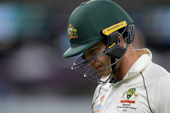 Tim Paine of Australia leaves the field after being dismissed by Tim Southee.