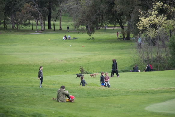 Locals using Northcote golf course as a park.