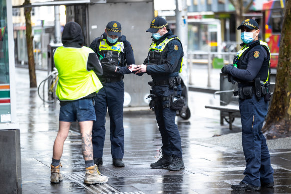 Protective Services officers patrolling and issuing fines in Melbourne's CBD on Tuesday.