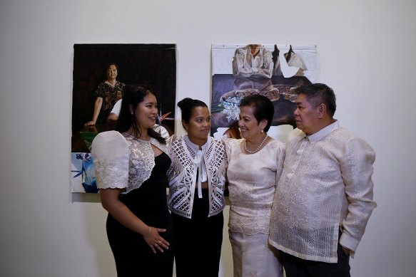 Marikit Santiago (second left) with her sister Josefina Santiago  and parents Myrna and Noy.