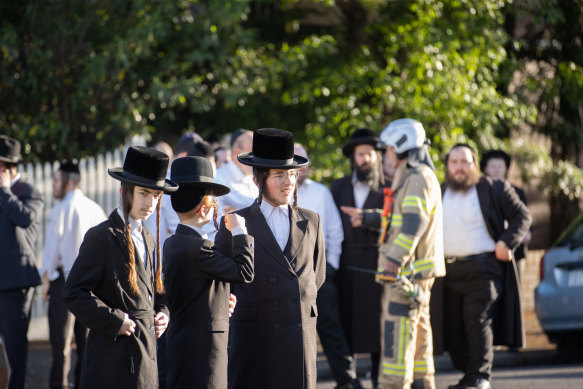 Congregants outside the synagogue on Friday morning.