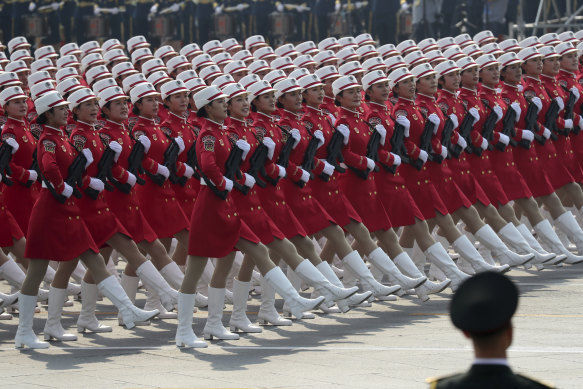 A Chinese military honour guard marches during the the celebration in Beijing on Tuesday.