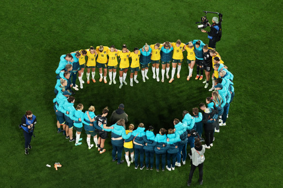 The Matildas squad huddle after the team’s defeat and elimination from the tournament.