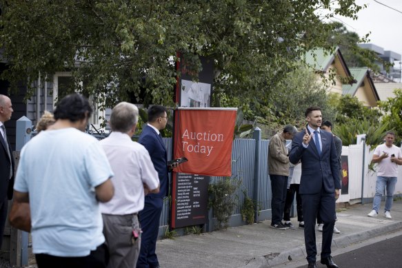 Nelson Alexander auctioneer James Pilliner during the Lord Street auction.