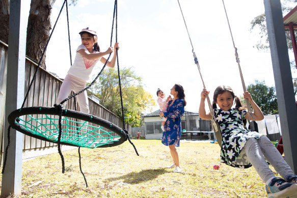 Amina Youssef-Shalala with her daughters, from left, Antoinette, Celine and  Lucia in their Sydney backyard.