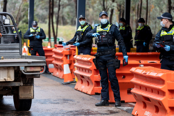 Victoria Police enforce border restrictions near Chiltern in July.