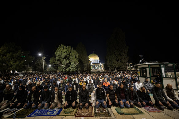 Muslims perform a tarawih prayer after breaking their fasts during the Holy month of Ramadan at the courtyard of the al-Aqsa Compound in Jerusalem on Tuesday evening.