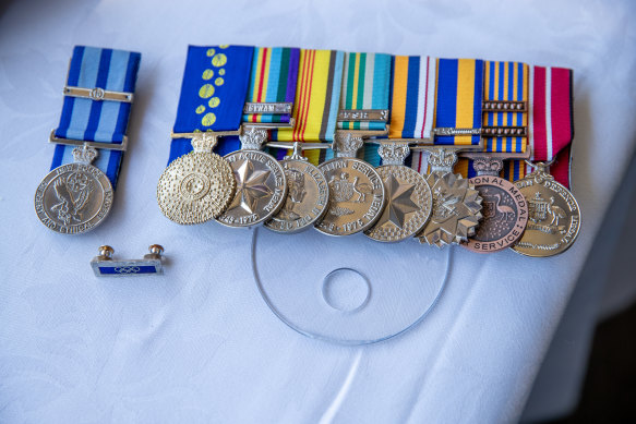 James’s RAN service medals and NSW Police medal.