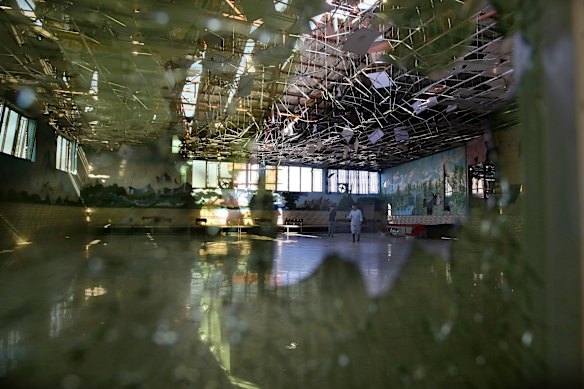 Shattered glass at the Dubai City wedding hall in Kabul after Saturday night's terrorist attack.