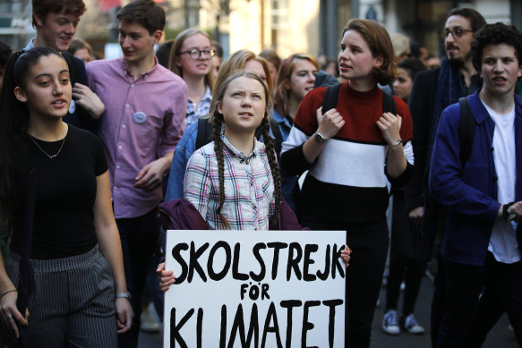 Greta Thunberg leading French students through Paris in 2019.