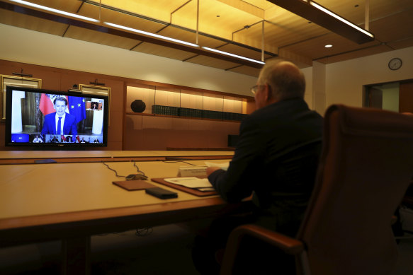 Prime Minister Scott Morrison speaks with Austrian Chancellor Sebastian Kurz during a meeting of the First Movers group.