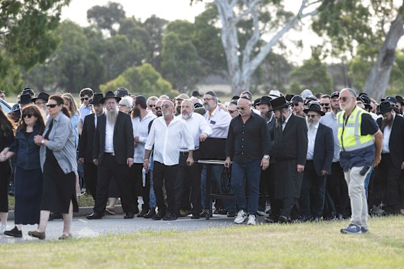Mourners gathered at the funeral of Reuven Morrison in Melbourne on Thursday evening.