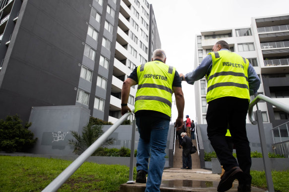 Building engineers inspect the Vicinity apartment complex.