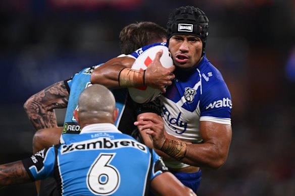 Bulldogs captain Stephen Crichton is tackled at Suncorp Stadium.