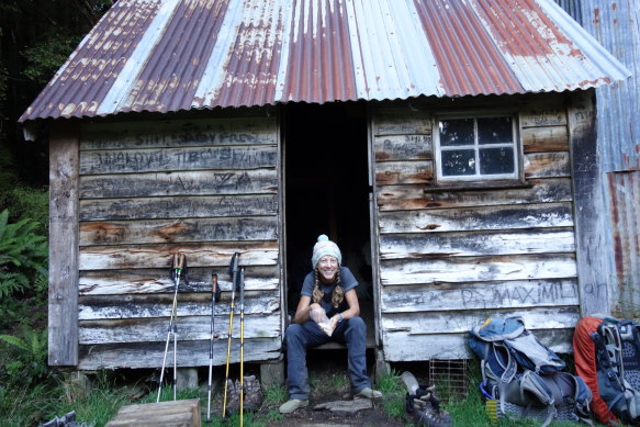 The author taking a break during her five-month hike in New Zealand.  