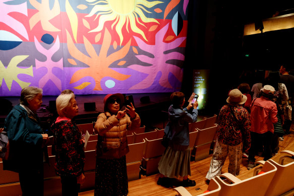 People funnel through the Joan Sutherland Theatre within the Opera House as part of the building’s 50th birthday celebrations held over the weekend.