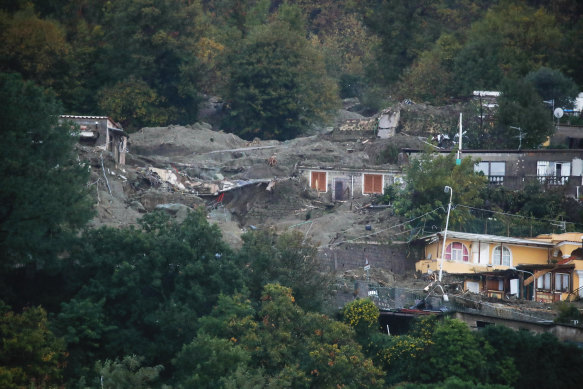 A view of flooded and mud covered houses are seen after heavy rainfall triggered landslides that collapsed buildings in Ischia.