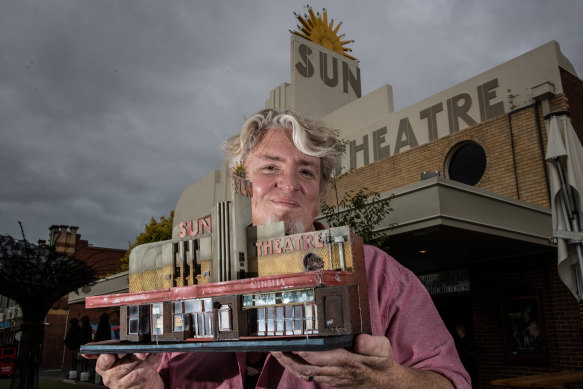 Time for your close up: Artist David Hourigan with his miniature of Yarraville's Sun Theatre.