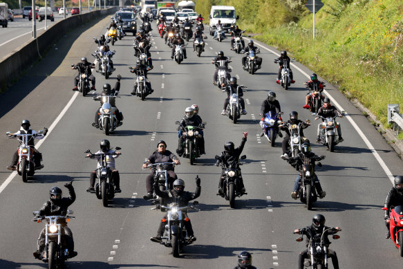 A procession of motorbikes heads along the Southern Motorway towards the Auckland Domain for an anti-lockdown protest  on Saturday.