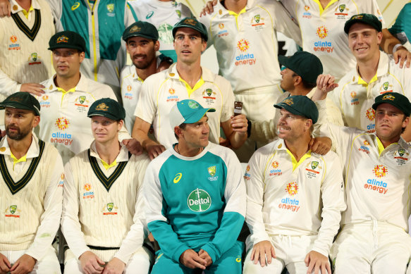 Justin Langer with the players he coached for four years.