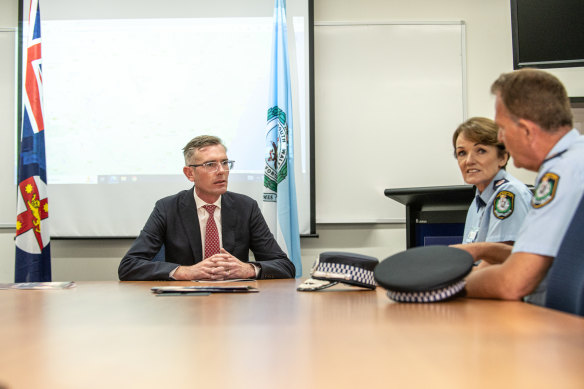 NSW Premier Dominic Perrottet, Police Commissioner Karen Webb and deputy commissioner Dave Hudson meet for a briefing on Tuesday.