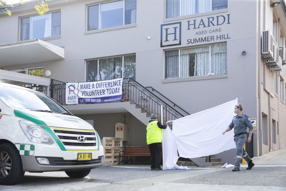 Summer Hill’s Wyoming aged care facility as residents were moved to hospital on Monday.