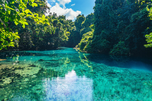 The blue holes in Espiritu Santo are one of the world’s rarest wonders. Pictured: Riri Blue Hole.