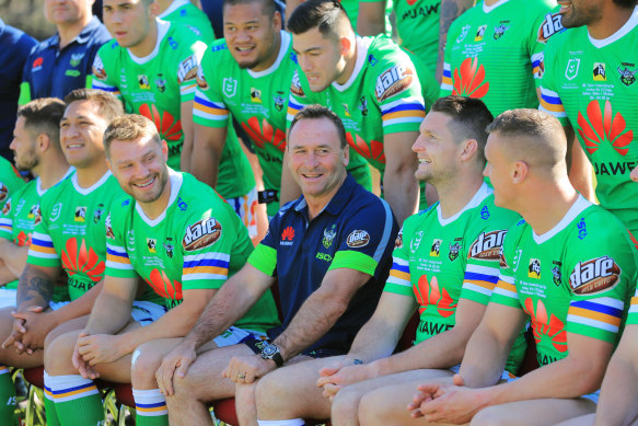 Raiders coach Ricky Stuart shares a laugh with his players.