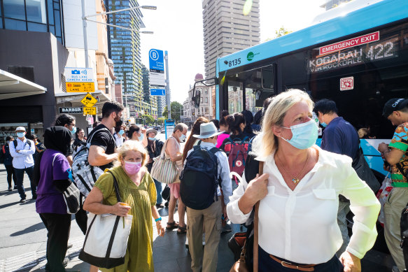 Long queues for buses at Central as commuters try to get home on Monday evening. 