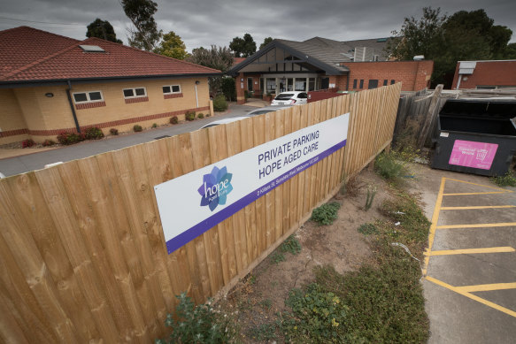 The fence Hope Aged Care had built last year during the pandemic, between it and another aged care home.
