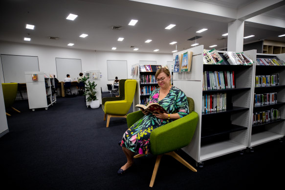 The library is made to look like daytime, but with all the blinds shut for security. 