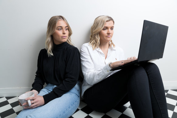 Lucy Foley (left) is on JobKeeper, while flatmate Annabel Ellis has remained in full employment.