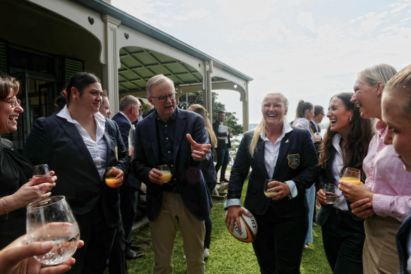 The Prime Minister chats with (from left) Josephine Sukkar, Eva Karpani, Emily Robinson, Maya Stewart and and sevens player Madi Levi.