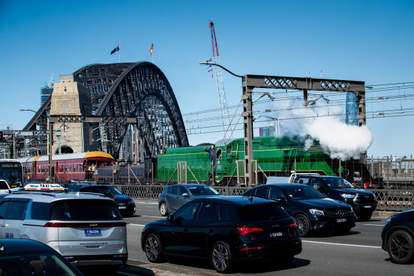 Locomotive 3801 crosses the Sydney Harbour Bridge on Sunday.