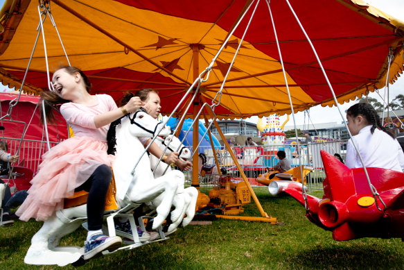 Children at a fair in Sydney last month. Melbourne schools have had to cancel fetes this year, losing important funding. 