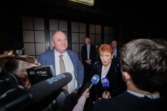 Barnaby Joyce and Pauline Hanson talk to reporters outside a One Nation fundraising function in Melbourne.