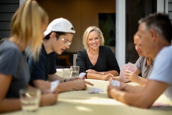 Psychologist and mother of daughters aged 23 and 25, Sabina Read (pictured with her family and a friend during COVID) says economic factors are among conditions causing young adults to “boomerang” back to parents’ homes.