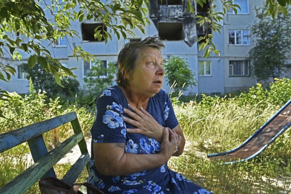 Sitting in a small park among apartment buildings in Borodyanka, Nadiya Hurina, a former teacher, recounts her experience of hugging her sister and saying goodbye thinking they would die when her building was almost completely destroyed by airstrikes.