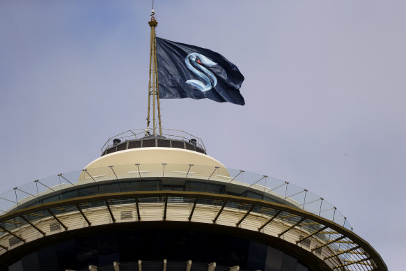 The Kraken logo flies above Seattle's famous Space Needle.