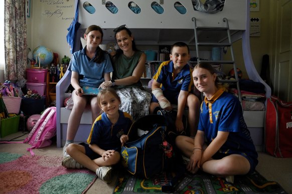 Kim Harley with her children Mackenzie (rear left), Matilda (front left), Harrison and Sienna. 