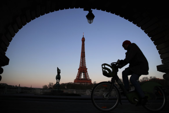 The reduced speed limit in Paris is intended to cut pollution, while also encouraging bike and pedestrian traffic.