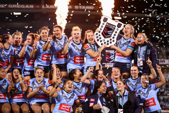 NSW Blues celebrate victory in Canberra after winning the 2022 Origin series. 
