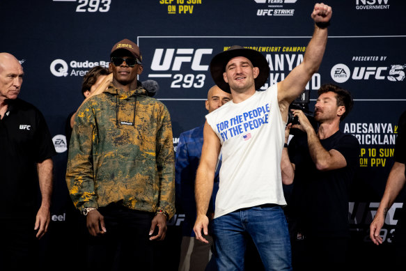 UFC fighters Israel Adesanya and Sean Strickland face off ahead of their middleweight fight in September 2023.