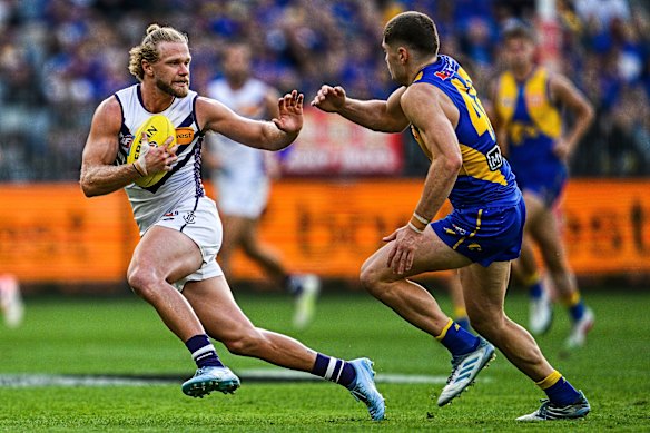 Corey Wagner of the Dockers runs with the ball during Sunday’s Western Derby.