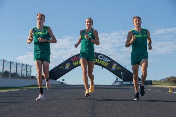 Jack Rayner (right) going for a run on Mount Panorama with Australian teammates Stewart McSweyn and Rose Davies.