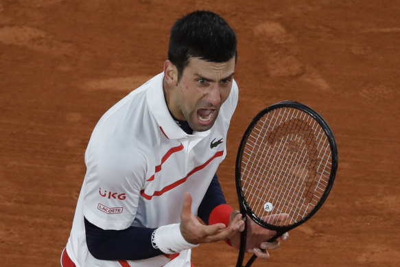 Novak Djokovic reacts en route to his quarter-final victory over Pablo Carreno Busta.
